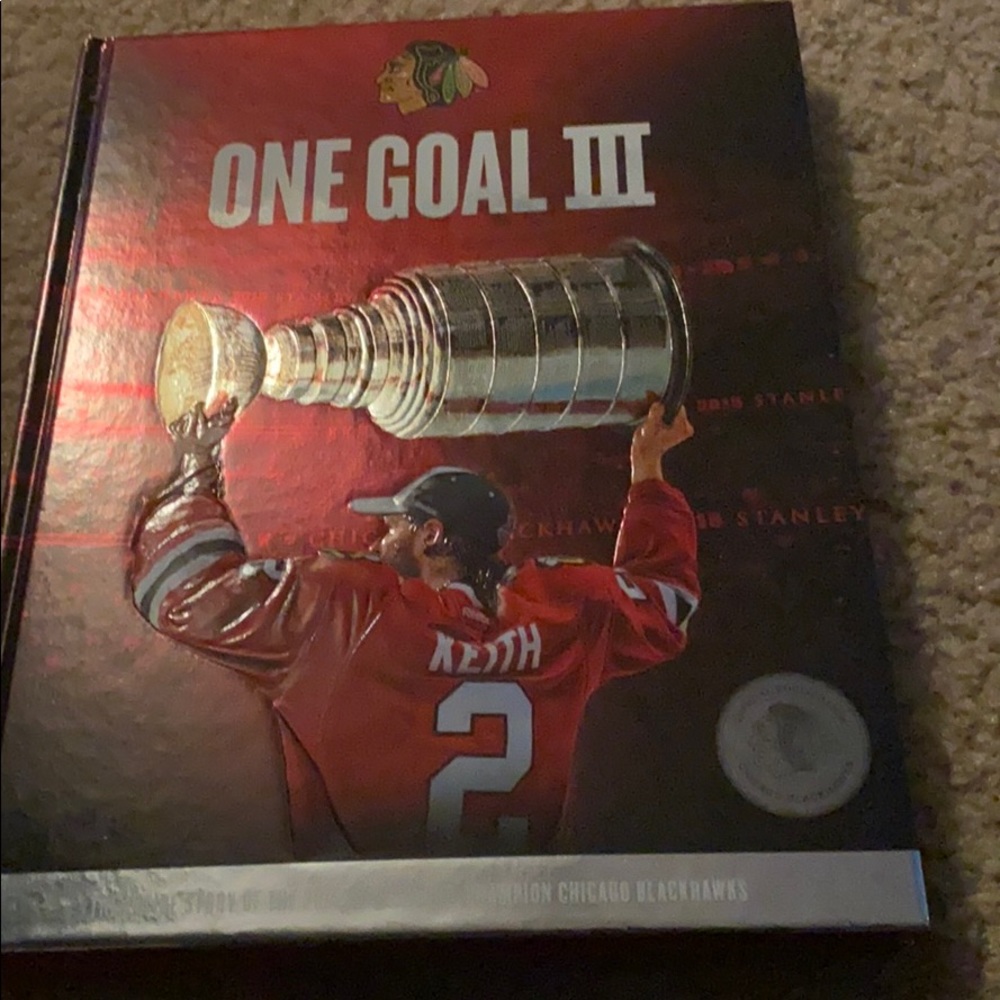 Black hawks 2015  Stanley cup book. Comes with DVD
